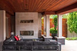 A living room with a couch and fireplace