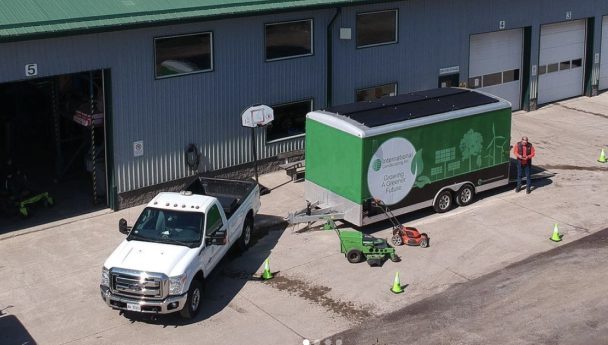 The International Landscaping shop building with a company truck and trailer.