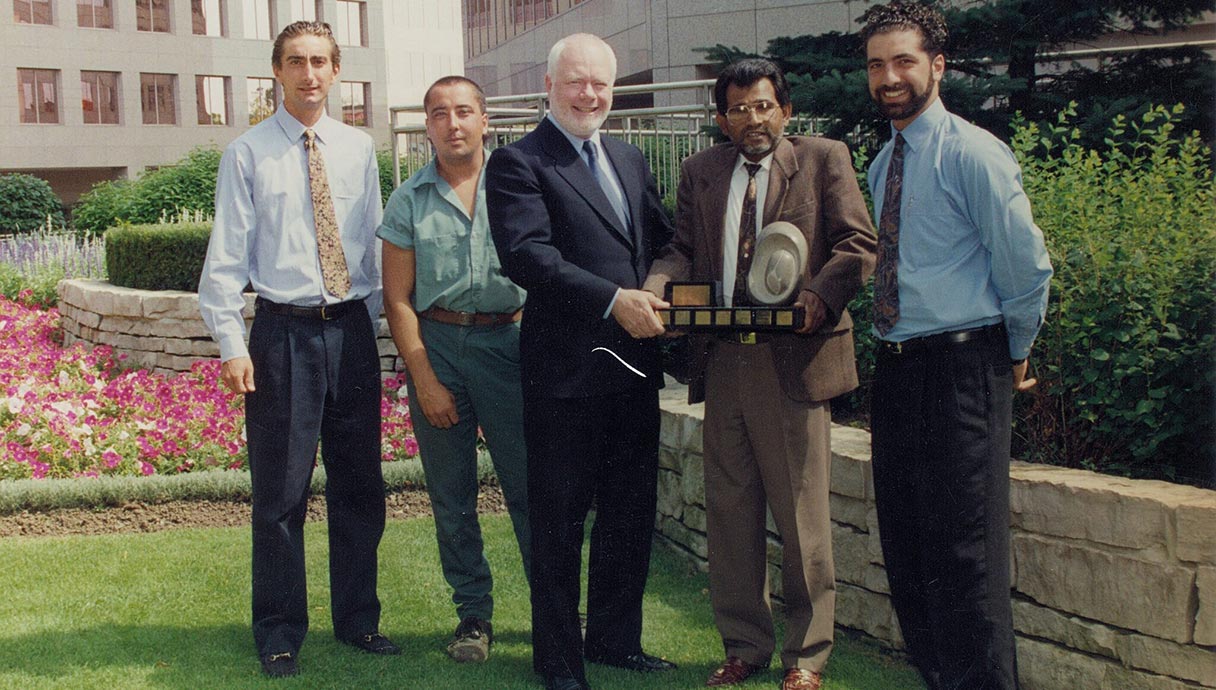 A group of men standing next to each other.